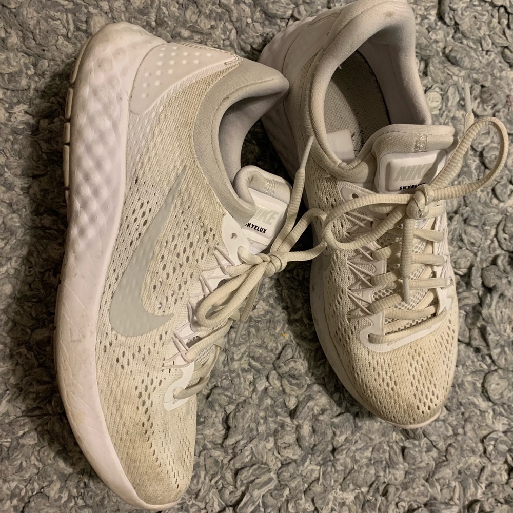 worn nike tennis shoes